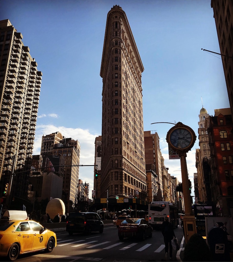 Traffic on city street and buildings against sky week law innovative