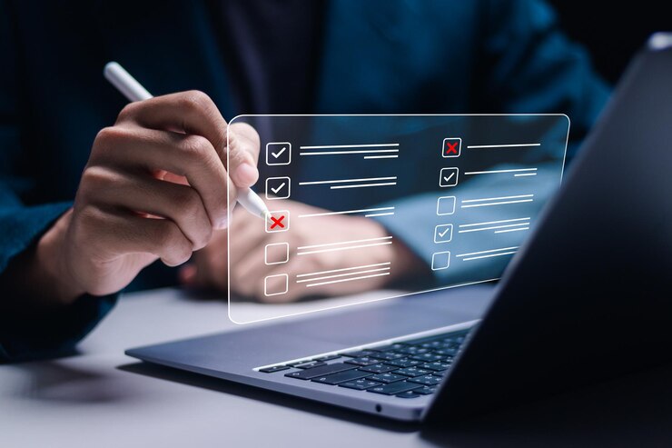 Questionnaire with checkboxes Businessman use laptop with filling survey form online answer questions of test Survey form concept Education futuristic technology and learning concept